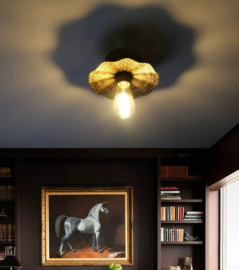 Vintage Metal Ceiling Light Fixture With Brass Finish, Split Flower Design, illuminating a cozy living room with retro vibe