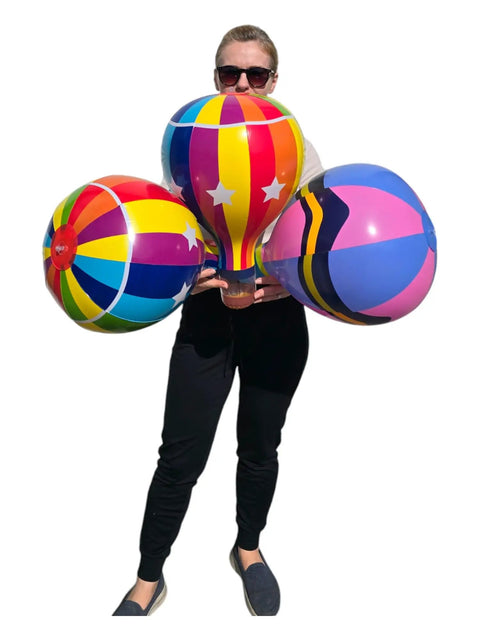 Person holding Multicolor 18 Inch Inflatable Hot Air Balloons Set With 3 Designs 3 Pack For Kids Parties Party Favors