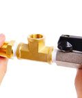 Close-up of Brass Pipe Fitting Tee Half Inch Half Inch Half Inch NPT Female Thread Adapter in a hand, showcasing detailed construction.
