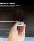 A hand installing Stainless Steel Semi Circle Cabinet Pulls 40mm Recessed Drawer Handles 4 Pack Brushed Hardware on drawer.