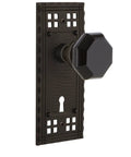 Close-up of Craftsman Plate With Keyhole And Waldorf Black Door Knob Passage Set In Oil Rubbed Bronze Finish