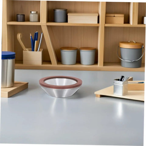 Pro Diamond Cup Grinding Wheel 100mm Silver Concave Bowl that Cuts Like Hell, displayed on a workshop table.