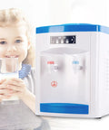 Powerful 550W Desktop Water Cooler Dispenser With Hot And Cold And Room Temperature Water, 4.9 Gallon Top Loading Unit next to child