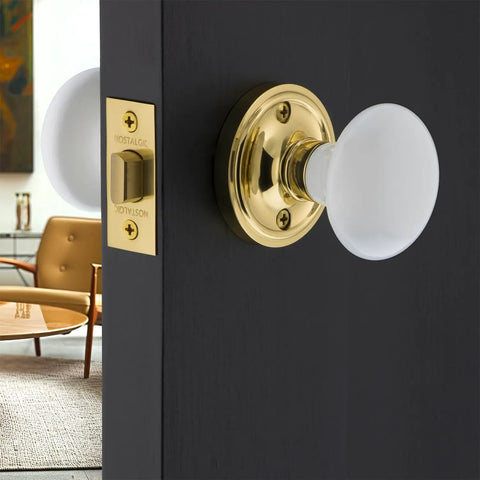 Porcelain Door Knob Set with Classic Rosette for Hallways and Closets, white ceramic knobs, polished brass, installation view