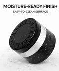 Amazon 3-inch spice grinder with dual grind plates; black body, silver band, angled side view