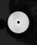 Close-up of white plastic gear from 550 Gear Box Set For Kids Must Have Ride On Car Replacement Gears Kit Large Middle Small Drive Gears