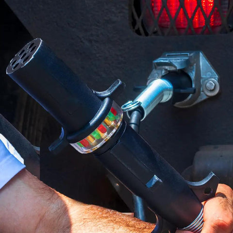 7 Way Round Pin Tractor Trailer Circuit Chaser On Road Testing Tool in use for turn signals, hazard lights, and brake lights diagnostics.