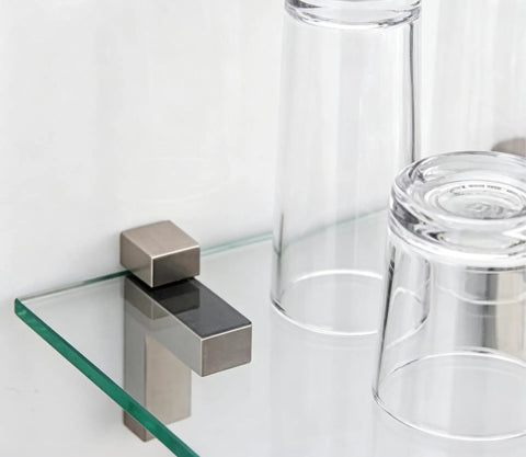 Four Pack Mini Brushed Zinc Alloy Glass Shelf Clamps With Rubber Cushions fixing a glass shelf, clear glasses on top