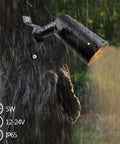 Low Voltage Landscape Tree Lights For Outdoors With Moonlight Glow mounted on tree trunk in rain