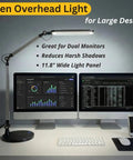 LED Architect Desk Lamp With Wireless Charger And Adjustable Swing Arm for Home Office, lighting dual monitors on a desk.
