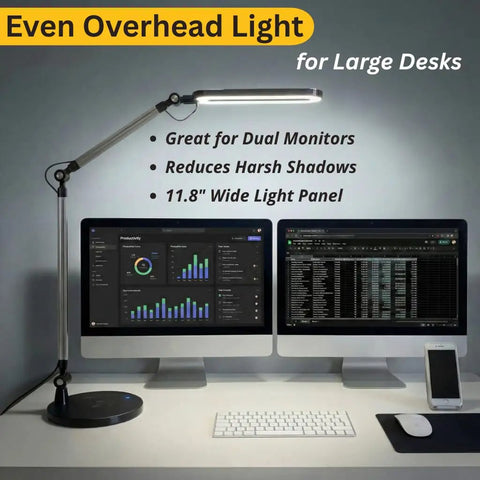 LED Architect Desk Lamp With Wireless Charger And Adjustable Swing Arm for Home Office, lighting dual monitors on a desk.