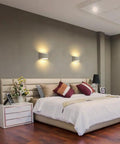 Modern Led Wall Sconce Set Of 2 Up And Down Lighting 2700K Warm White indoor gypsum lampshade above a bed in a stylish bedroom