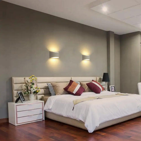 Modern Led Wall Sconce Set Of 2 Up And Down Lighting 2700K Warm White indoor gypsum lampshade above a bed in a stylish bedroom
