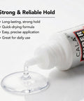 Pro Quick Dry Nail Glue For False Nails And Tips That Delivers A Strong Hold, close-up on nozzle dispensing glue, 0.5 oz bottle