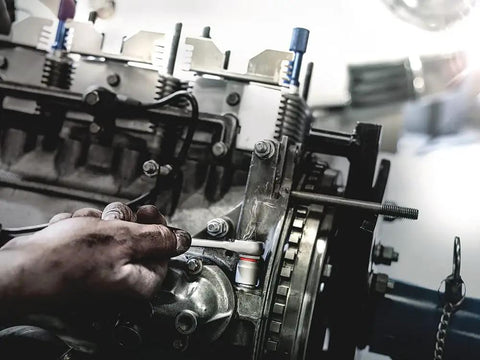 Mechanic using Zyklop 8790 HMA One Quarter Inch Socket With Hex Head Four Millimeter And Twenty Three Millimeter Length Knurled Grip