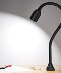 450 Lumen COB LED Work Light with flexible gooseneck illuminating tools on a workbench for machine tools and lathe workbenches.