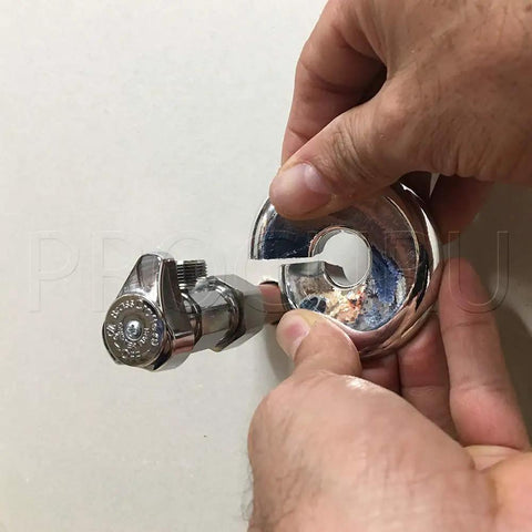 Split Chrome Plastic Escutcheon Cover Plate For 1/2 Inch CTS Copper Pipe And PEX installation demonstration with hands holding plate