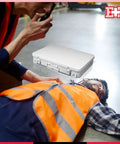 First Aid Metal Case Number 36 Fourteen By Ten By Two Point Five Inches Built Tough Dope Metal Medical Supply Case For Safe Storage Government Spec Approved Compact Emergency Kit Box on table in emergency scene