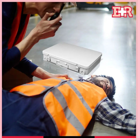 First Aid Metal Case Number 36 Fourteen By Ten By Two Point Five Inches Built Tough Dope Metal Medical Supply Case For Safe Storage Government Spec Approved Compact Emergency Kit Box on table in emergency scene