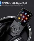 Dope 32GB MP3 Player With Bluetooth 5.3 shown with icons on screen, black headphones around, on dark background.