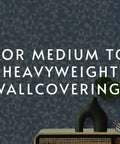PRO 838 Heavy Duty Clear Wallpaper Adhesive for Non Wovens and Commercial Weight Wallcoverings text over dark wall