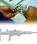 Person using Vernier Caliper 3 Inch Stainless Steel Measuring Tool 0 To 50mm Manual Caliper With Storage Bag For Mechanical Work
