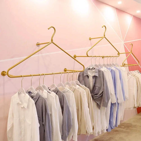 Score This Premium Wall Mount Clothes Rack With Heavy Duty Steel Shelves And Heart Shaped Design To Level Up Your Boutique Floor Or Cozy Apartment Vibe