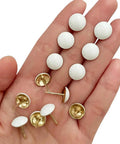 Hella Sturdy White Upholstery Tacks And Decorative Thumbtacks For Sofa Headboards And Furniture Trim With Top Shelf Hardware featuring round white heads.