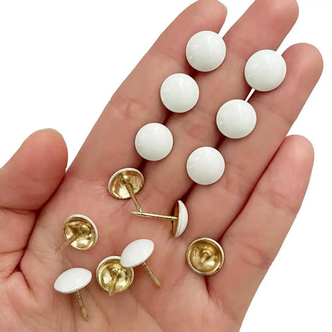 Hella Sturdy White Upholstery Tacks And Decorative Thumbtacks For Sofa Headboards And Furniture Trim With Top Shelf Hardware featuring round white heads.