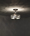 Antique Bronze Crystal Flush Mount Chandelier, Three Light Ceiling Light Fixture With Iron Lattice Frame, Semi Flush Mount Sleek Modern Glam For Living Room And Dining Area illuminating a room.