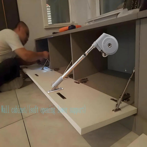 Soft Closing Cabinet Hinge With 105 Degree Pull Down Support installed on cabinet door for smooth soft opening.