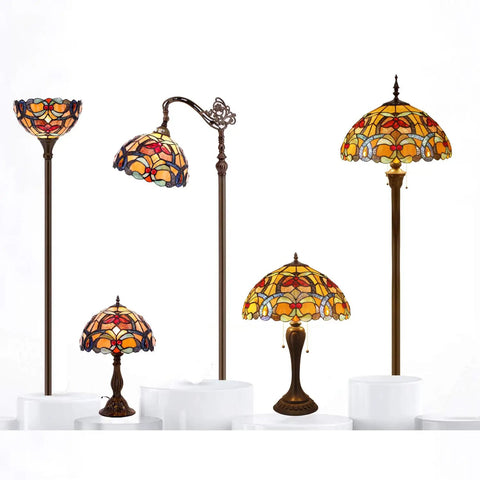 Different Tiffany-style stained glass flower lamps with bronze bases, various heights, including Orange Stained Glass Flower Tiffany Style Table Lamp For Reading Desk And Bedside Use 12 Inch Wide Shade 18 Inch Tall With Antique Green Bronze Base UL Listed Cord Switch Ideal For Bedroom Living Room Or Home Office Decor.