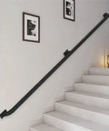 Heavy Hitter Black Wrought Iron Banister Handrails Featuring No Sweat Installation For Indoor Outdoor Stair Safety Railings With Durable Anti Rust Coating And Secure Wall Mount Grab Bars on a stairway