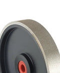Side view of 6 Inch CBN Grinding Wheel With Adjustable Bore And Auto Adapter Fitting 3/4, 5/8, 1/2 Inch, 800 Grit, 1 Inch Wide Plastic Body