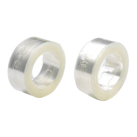 Two rolls of clear plastic balloon garland strip for DIY wedding arch decor.