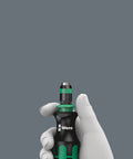 Hand holding 7 In 1 Bitholding Screwdriver With Extendable Bayonet Blade Rapidaptor Quick Release Chuck Built In Bit Storage And Pouch.