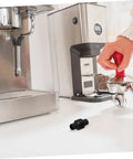 Espresso Steam Wand Sleeve Heatproof Rubber Insulation Cover for Coffee Machines next to espresso setup in kitchen