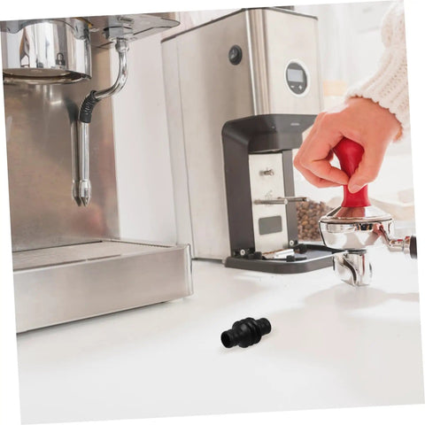 Espresso Steam Wand Sleeve Heatproof Rubber Insulation Cover for Coffee Machines next to espresso setup in kitchen
