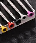 Close-up of Watch Repair Screwdriver Kit with color-coded 3 piece and 1 piece set for movements triangular oscillating weight rotor tools.