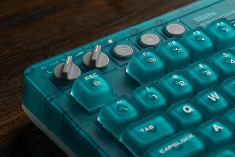 Retro 87 Key Wireless Mechanical Keyboard Hot Swap Silky Linear Switches with volume and Bluetooth buttons in clear blue finish.