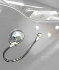 Top Shelf Saddlebag Mount Pins For Harley Touring Quick Release Bail Studs showing chrome bolt and black wire for easy setup.