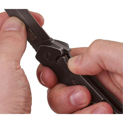 Using the Dead Simple Pocket Knife With Smooth Slide Action and Heavy Duty Plastic Guard for cutting with precision.