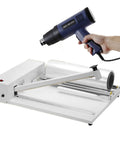 Heavy Duty Shrink Wrap Machine Kit With Heat Gun And Bar Sealer For 12 18 And 24 Inch Film Rolls, showing heat gun and shrink wrap setup.