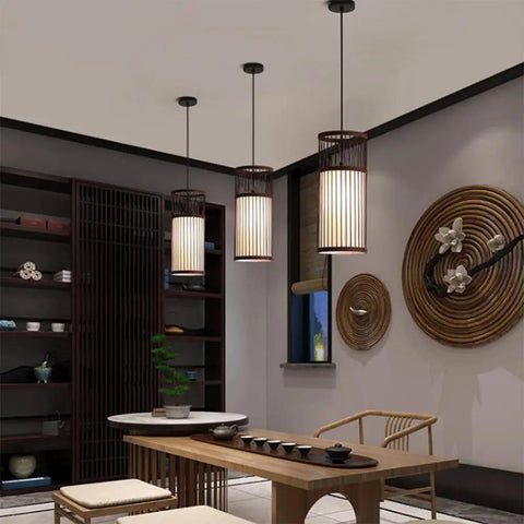 YAXDQUW Modern Style Bamboo Pendant Light Handcrafted Hanging Ceiling Lamp in dining area with three shades.
