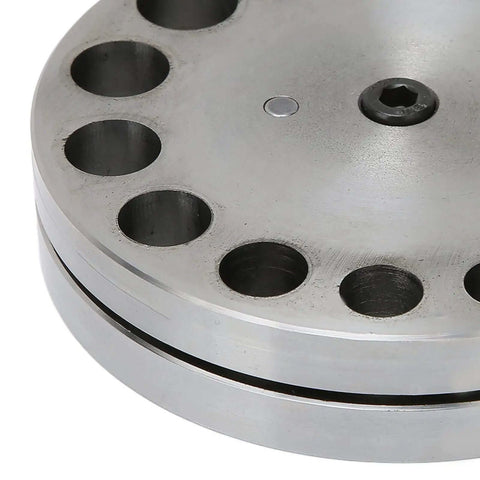 Close-up of Disc Cutter Set With Seventeen Dies for Metal Forming Punch Die Discs showing steel construction for crafting