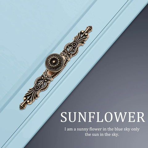 5 Piece Vintage Antique Floral Cabinet Handles Set With Bronze Finish For Dresser Drawers And Cupboards displayed on blue surface