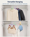 Ultra Compact Foldable Travel Hangers Set for Cruise Ship and Air Travel, hanging shirts, jackets, and accessories in closet.