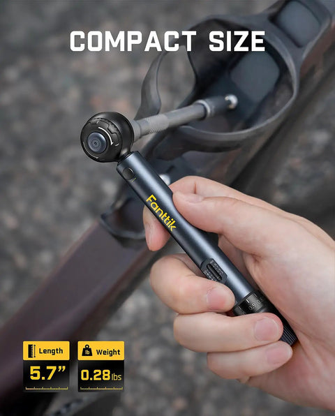 Mini Click Torque Wrench Set For Bikes With 1/4 Inch Drive, 2-10 Nm Range in hand, showing compact size and black finish.