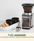 Electric Burr Coffee Grinder With One Touch Automation And Eighteen Position Grinding Dial For Hella Precise Fresh Beans on kitchen counter.