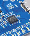 Close-up of Power-Z SINK240 USB PD3.1 Trigger Board USB C Decoy Module 240W 48V PPS AVS Voltage Tester blue circuit board